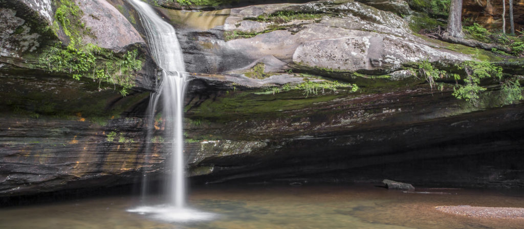 Hocking Hills is scenic and great for hikers. Travel to Ohio for one of the best family weekend getaways Midwest.